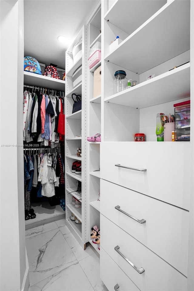 3201 NE 9th Ter, Pompano Beach, FL 33064 - spacious closet featuring light marble finish flooring