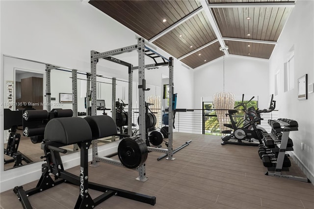 12880 N Bayshore Dr, North Miami, FL 33181 - exercise room featuring high vaulted ceiling, wood ceiling with exposed beams, a chandelier, and recessed lighting