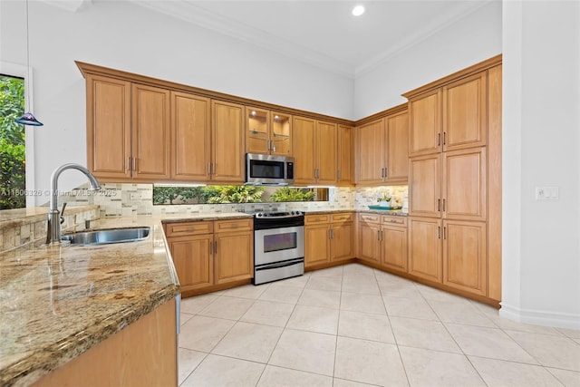 11034 Via, San Remo, Boynton Beach, FL 33437 - kitchen with appliances with stainless steel finishes, a sink, light stone countertops, backsplash, and light tile patterned flooring