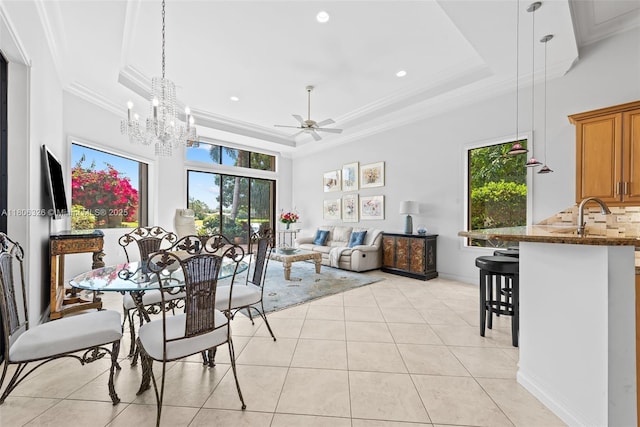 11034 Via, San Remo, Boynton Beach, FL 33437 - dining area with ornamental molding, healthy amount of natural light, a ceiling fan, a raised ceiling, and light tile patterned floors