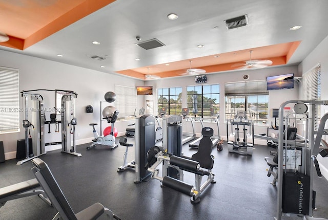 11034 Via, San Remo, Boynton Beach, FL 33437 - workout area featuring a raised ceiling, recessed lighting, ceiling fan, and baseboards
