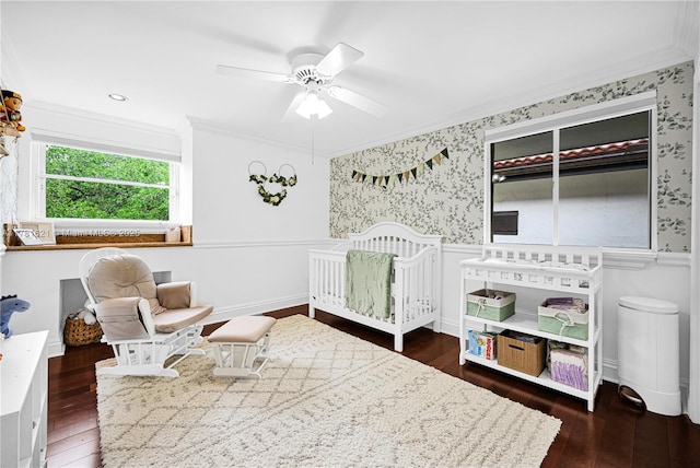 9866 SW 111th Ter, Miami, FL 33176 - bedroom featuring ornamental molding, wallpapered walls, hardwood / wood-style flooring, a crib, and a ceiling fan