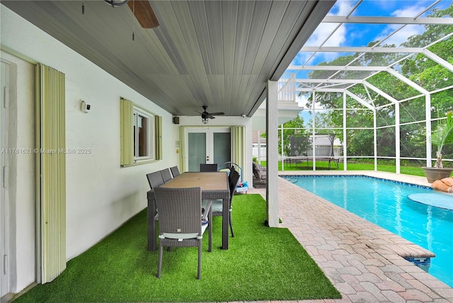 9866 SW 111th Ter, Miami, FL 33176 - swimming pool featuring a ceiling fan, a patio, french doors, a yard, and a lanai