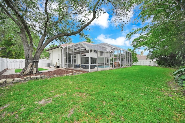 9866 SW 111th Ter, Miami, FL 33176 - rear view of house with glass enclosure and a patio area