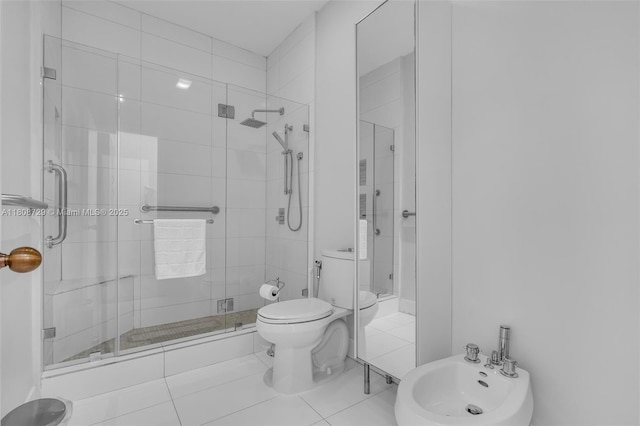 101 Ocean Lane Dr Unit 4012, Key Biscayne, FL 33149 - full bathroom with a bidet, toilet, a shower stall, and tile patterned flooring