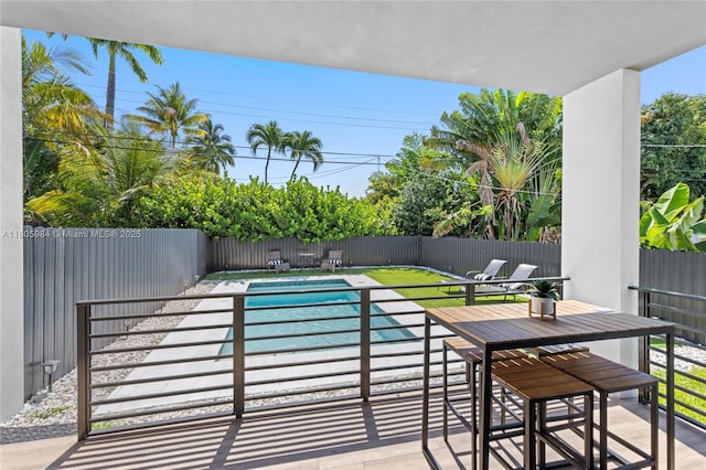 1116 NE 10th Ave, Fort Lauderdale, FL 33304 - view of swimming pool with a fenced backyard and a patio