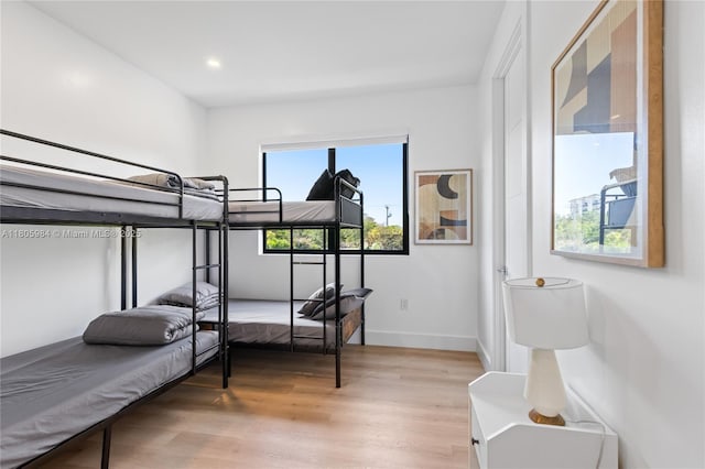 1116 NE 10th Ave, Fort Lauderdale, FL 33304 - bedroom with light wood-style floors and recessed lighting
