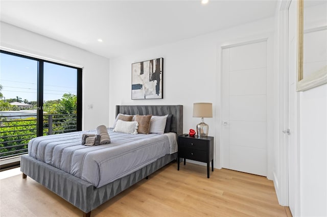 1116 NE 10th Ave, Fort Lauderdale, FL 33304 - bedroom featuring light wood finished floors, access to outside, and recessed lighting