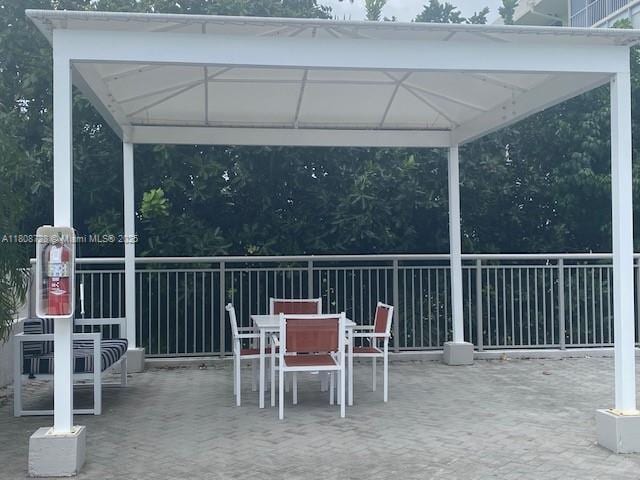 18061 Biscayne Blvd Unit Ph02, Aventura, FL 33160 - view of patio / terrace featuring a gazebo and outdoor dining area