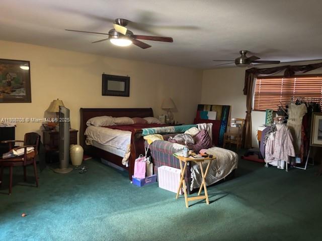 9301 SW 16th St, Miami, FL 33165 - carpeted bedroom with a ceiling fan