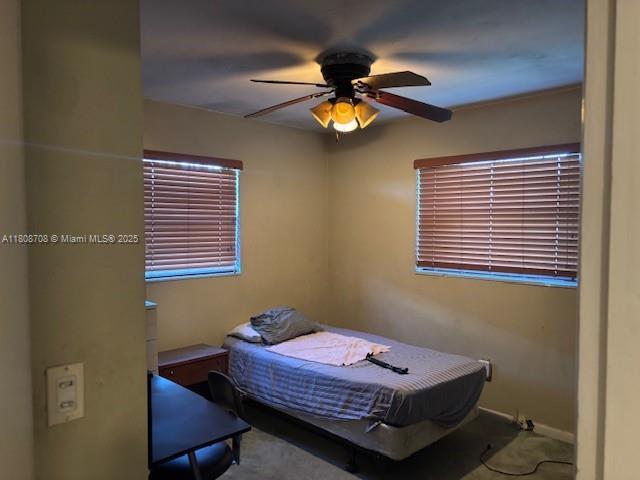 9301 SW 16th St, Miami, FL 33165 - bedroom featuring ceiling fan, baseboards, and carpet flooring