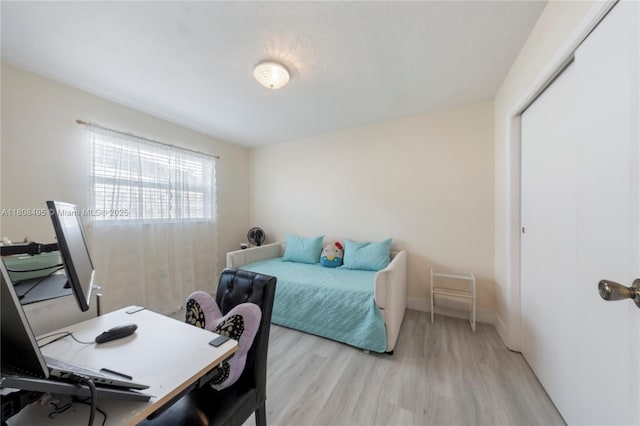 9362 NW 24th Pl, Sunrise, FL 33322 - bedroom featuring an office area, light wood-style floors, and a closet