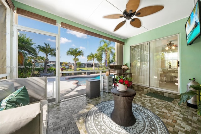 9362 NW 24th Pl, Sunrise, FL 33322 - sunroom / solarium featuring a ceiling fan