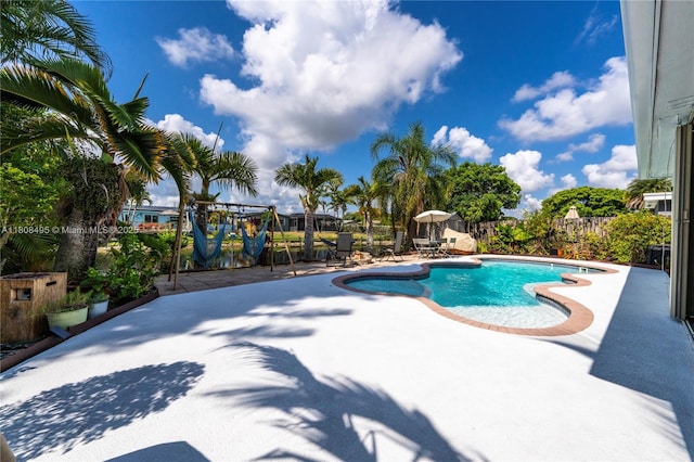 9362 NW 24th Pl, Sunrise, FL 33322 - view of swimming pool with a patio