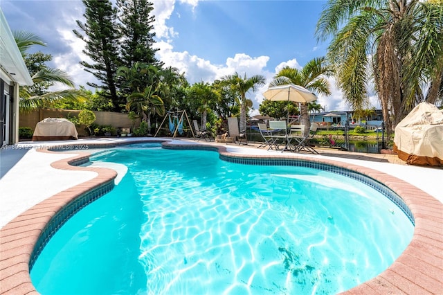 9362 NW 24th Pl, Sunrise, FL 33322 - view of pool featuring a fenced backyard and a patio area