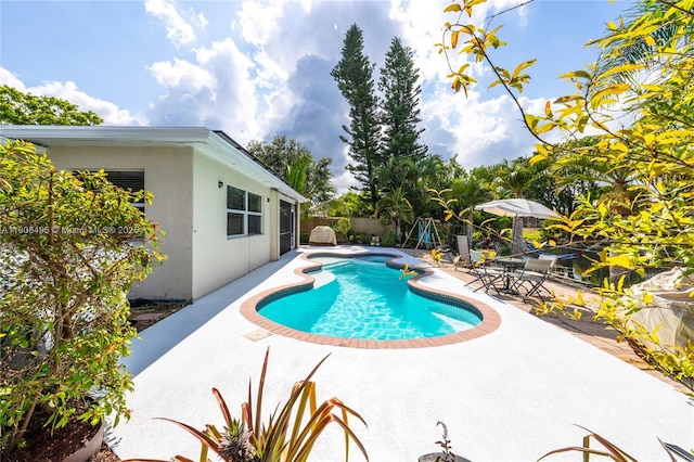 9362 NW 24th Pl, Sunrise, FL 33322 - view of swimming pool with a patio