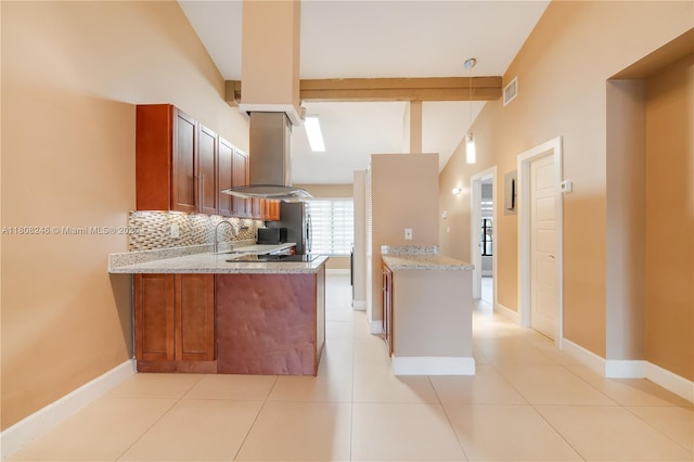 10760 Hickory Ave, Pembroke Pines, FL 33026 - kitchen with a peninsula, a sink, tasteful backsplash, brown cabinetry, and beam ceiling