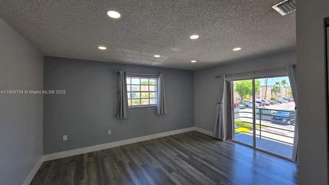 11890 SW 18th Ter Unit 112, Miami, FL 33175 - empty room with dark wood-style floors, recessed lighting, a textured ceiling, and baseboards