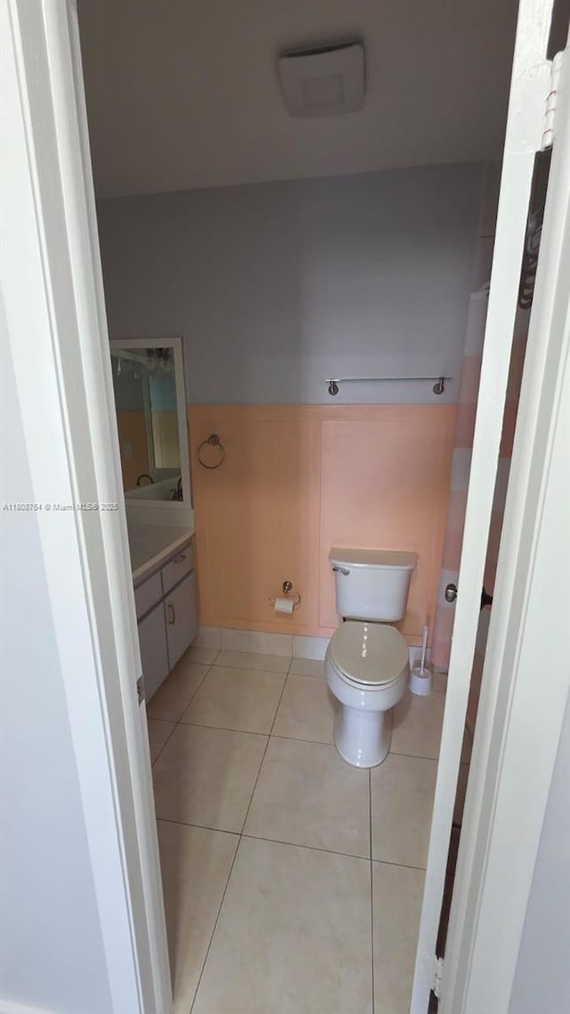 11890 SW 18th Ter Unit 112, Miami, FL 33175 - bathroom with toilet, vanity, and tile patterned floors