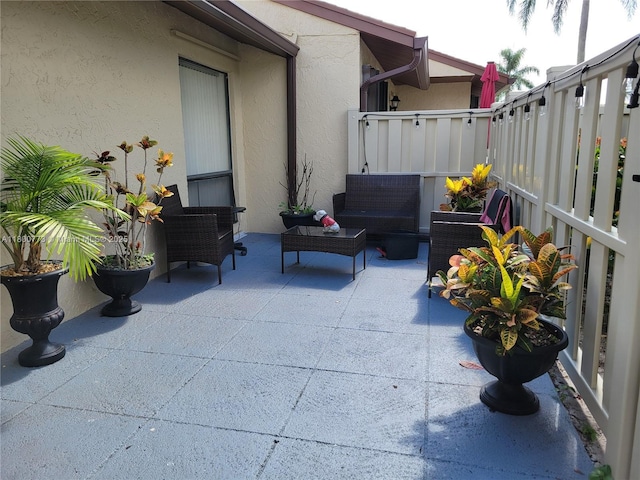 1025 Green Pine Blvd Unit B, West Palm Beach, FL 33409 - view of patio / terrace featuring an outdoor living space