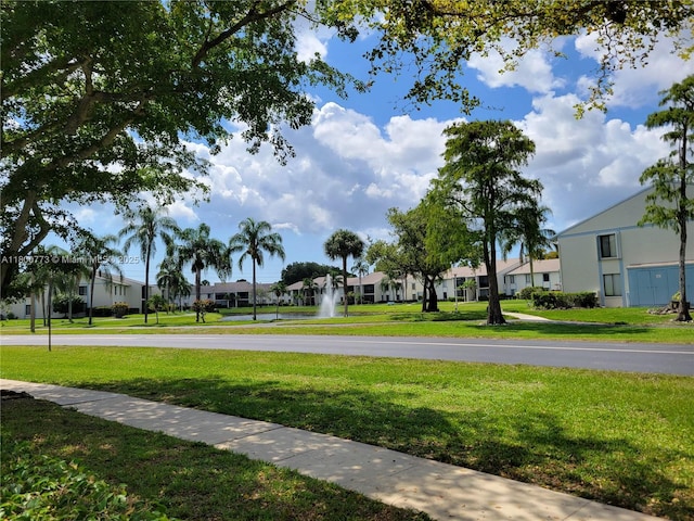 1025 Green Pine Blvd Unit B, West Palm Beach, FL 33409 - view of asphalt street with a residential view and sidewalks