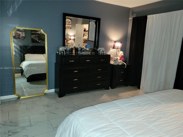 1025 Green Pine Blvd Unit B, West Palm Beach, FL 33409 - bedroom featuring light marble finish floors and baseboards