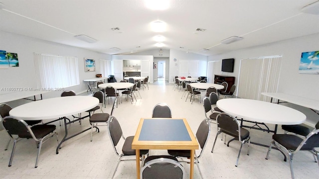 1025 Green Pine Blvd Unit B, West Palm Beach, FL 33409 - dining space with light flooring and lofted ceiling