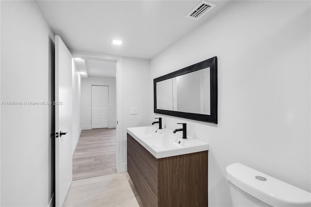 14475 Strathmore Ln Unit 305, Delray Beach, FL 33446 - bathroom featuring double vanity and toilet