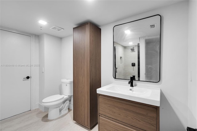 14475 Strathmore Ln Unit 305, Delray Beach, FL 33446 - bathroom with vanity, wood finished floors, and a shower