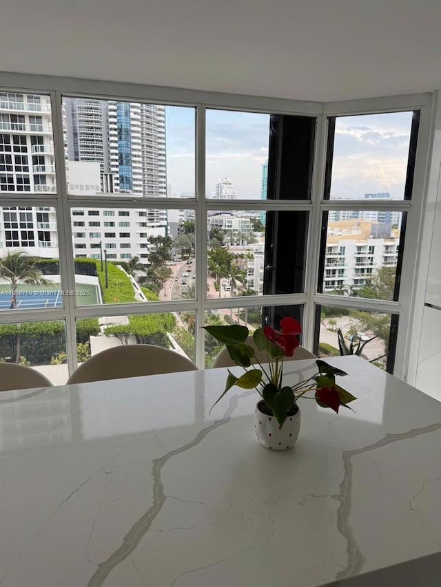 6423 Collins Ave Unit 1001, Miami Beach, FL 33141 - sunroom featuring a view of city and plenty of natural light