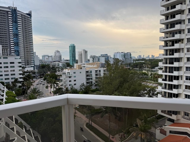 6423 Collins Ave Unit 1001, Miami Beach, FL 33141 - balcony at dusk with a skyline view