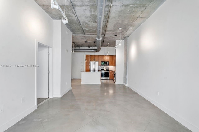 2001 Biscayne Blvd Unit 2308, Miami, FL 33137 - unfurnished living room featuring baseboards and finished concrete floors