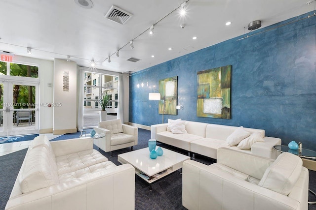 2001 Biscayne Blvd Unit 2308, Miami, FL 33137 - living area featuring baseboards, rail lighting, and french doors