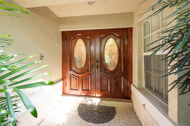 2215 SW 14th Pl, Boca Raton, FL 33486 - foyer with baseboards and light tile patterned flooring
