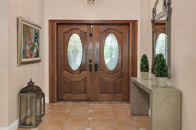 2215 SW 14th Pl, Boca Raton, FL 33486 - foyer with baseboards and light tile patterned flooring