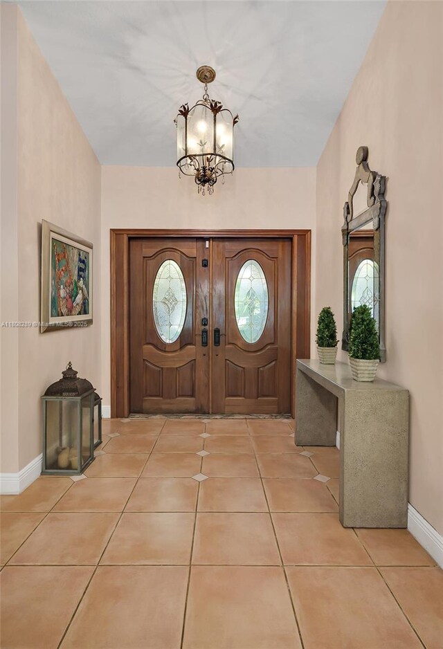2215 SW 14th Pl, Boca Raton, FL 33486 - office area with french doors, high vaulted ceiling, recessed lighting, and light tile patterned floors