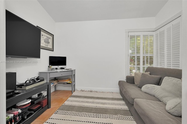 2215 SW 14th Pl, Boca Raton, FL 33486 - living area with a desk and light tile patterned floors