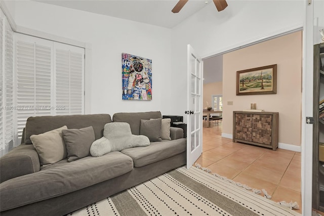 2215 SW 14th Pl, Boca Raton, FL 33486 - living room with a ceiling fan, light tile patterned flooring, and french doors