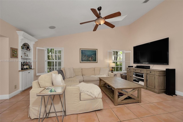 2215 SW 14th Pl, Boca Raton, FL 33486 - living room featuring lofted ceiling, light tile patterned floors, and a ceiling fan