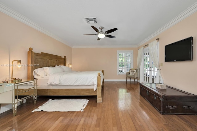 2215 SW 14th Pl, Boca Raton, FL 33486 - bedroom featuring crown molding, wood finished floors, and ceiling fan
