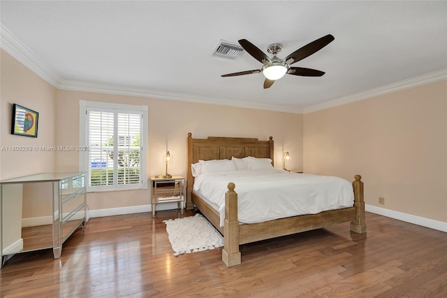 2215 SW 14th Pl, Boca Raton, FL 33486 - bedroom with ornamental molding, wood finished floors, and ceiling fan