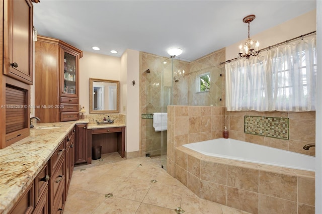 2215 SW 14th Pl, Boca Raton, FL 33486 - bathroom featuring a shower stall, a garden tub, tile patterned flooring, vanity, and a chandelier
