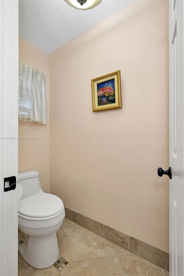 2215 SW 14th Pl, Boca Raton, FL 33486 - bathroom featuring toilet and tile patterned floors
