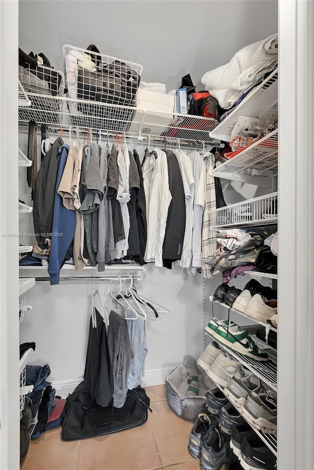 2215 SW 14th Pl, Boca Raton, FL 33486 - spacious closet featuring tile patterned flooring