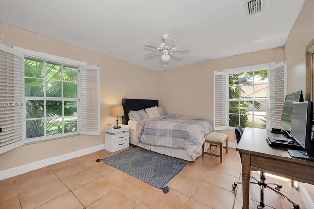 2215 SW 14th Pl, Boca Raton, FL 33486 - bedroom with light tile patterned floors, ceiling fan, and an office area
