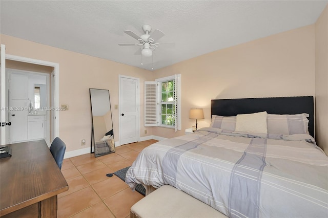 2215 SW 14th Pl, Boca Raton, FL 33486 - bedroom with light tile patterned floors, ceiling fan, and an office area
