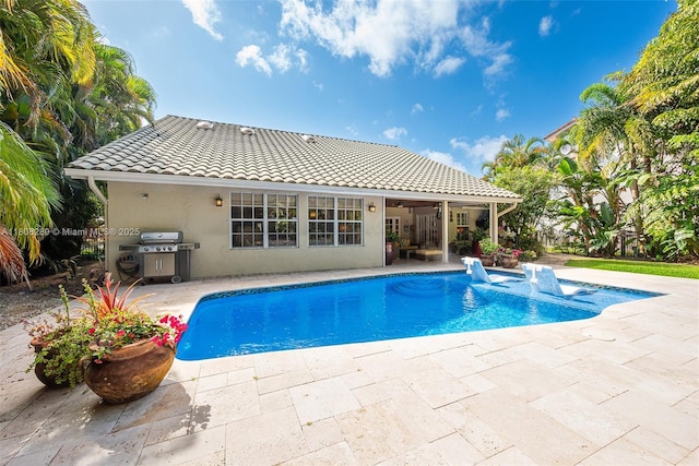 2215 SW 14th Pl, Boca Raton, FL 33486 - swimming pool featuring a patio, grilling area, and ceiling fan
