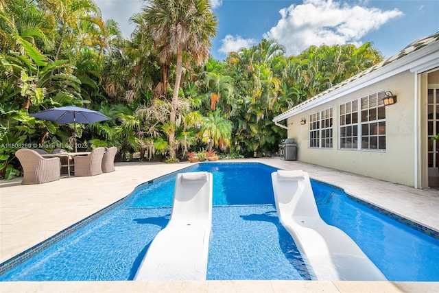 2215 SW 14th Pl, Boca Raton, FL 33486 - swimming pool featuring a patio