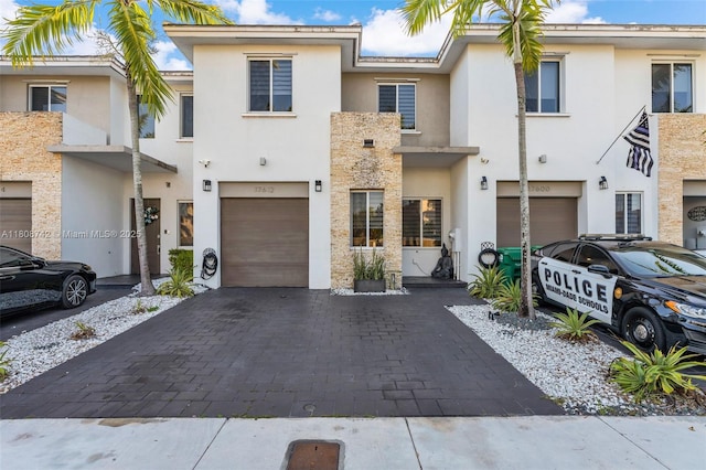 17612 SW 153rd Ave, Miami, FL 33187 - multi unit property featuring stucco siding, an attached garage, and driveway