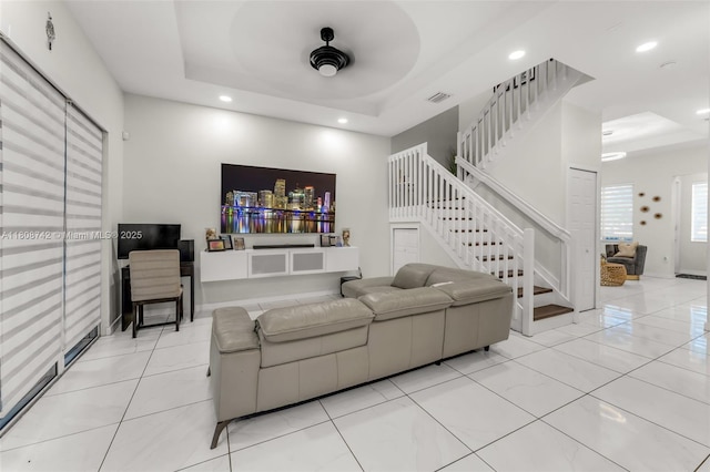 17612 SW 153rd Ave, Miami, FL 33187 - living area with a tray ceiling, stairs, recessed lighting, and baseboards